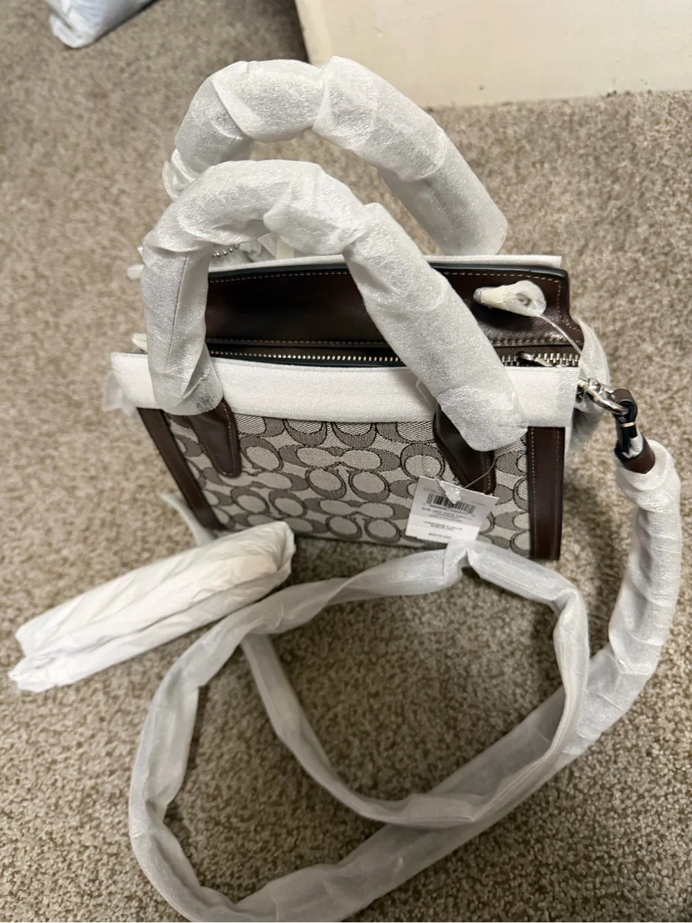 Coach Signature purse with Brown Leather Trim